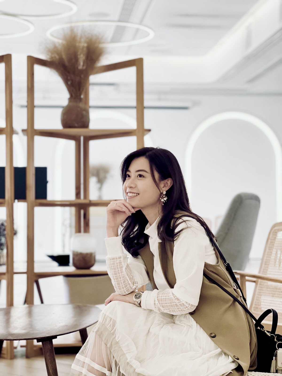 Iris, the calligrapher behind Petitegraphie, lettering at her Hong Kong studio table